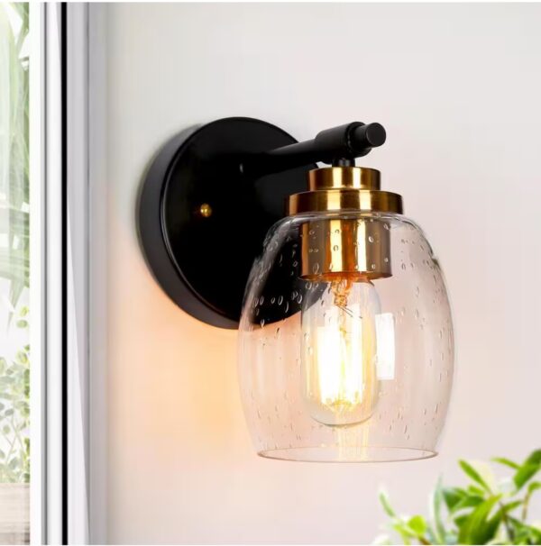 Transitional Cylinder Bathroom Wall Sconce 1-Light Industrial Plating Brass and Black Wall Light with Seeded Glass Shade